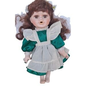 Vintage modern collectible porcelain or bisque doll.